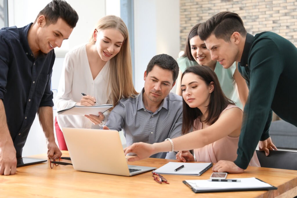 Group of people with business trainer at management seminar